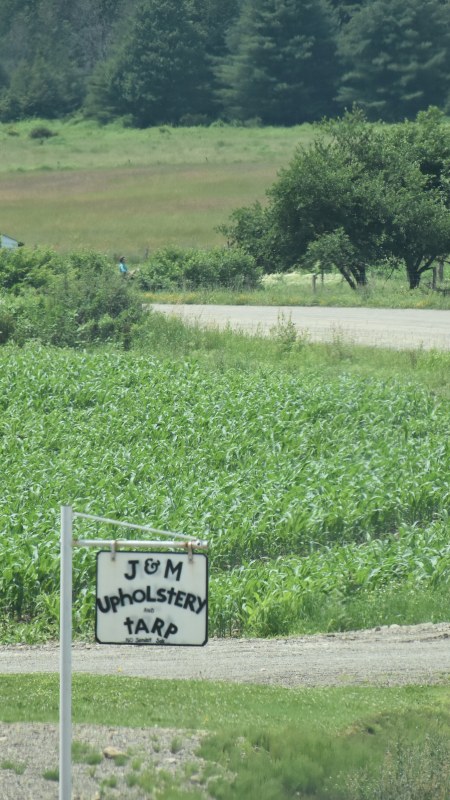 J & M Upholstrey Sign along NY's Amish Trail