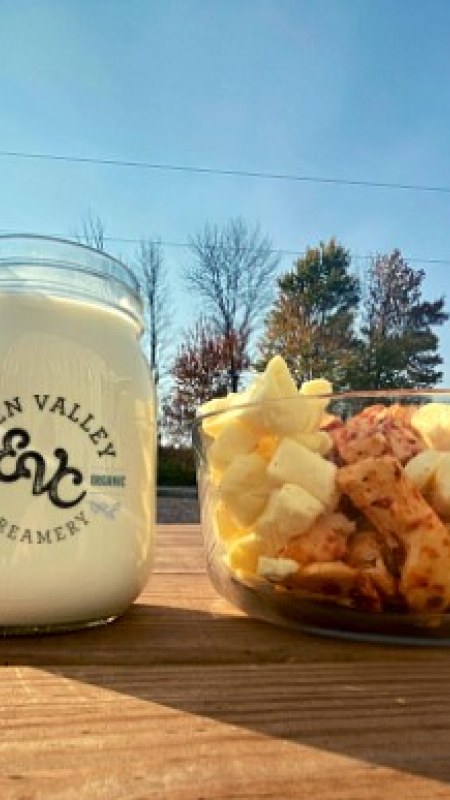 Finished cheese curd and glass of milk