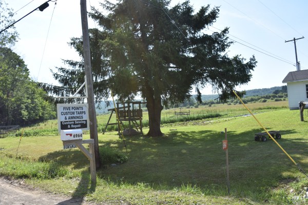 Custom tarps, awnings, sewing and repair sign