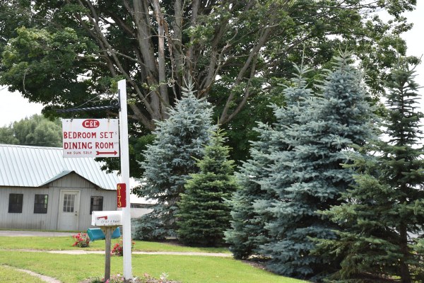 C & E Woodworking sign